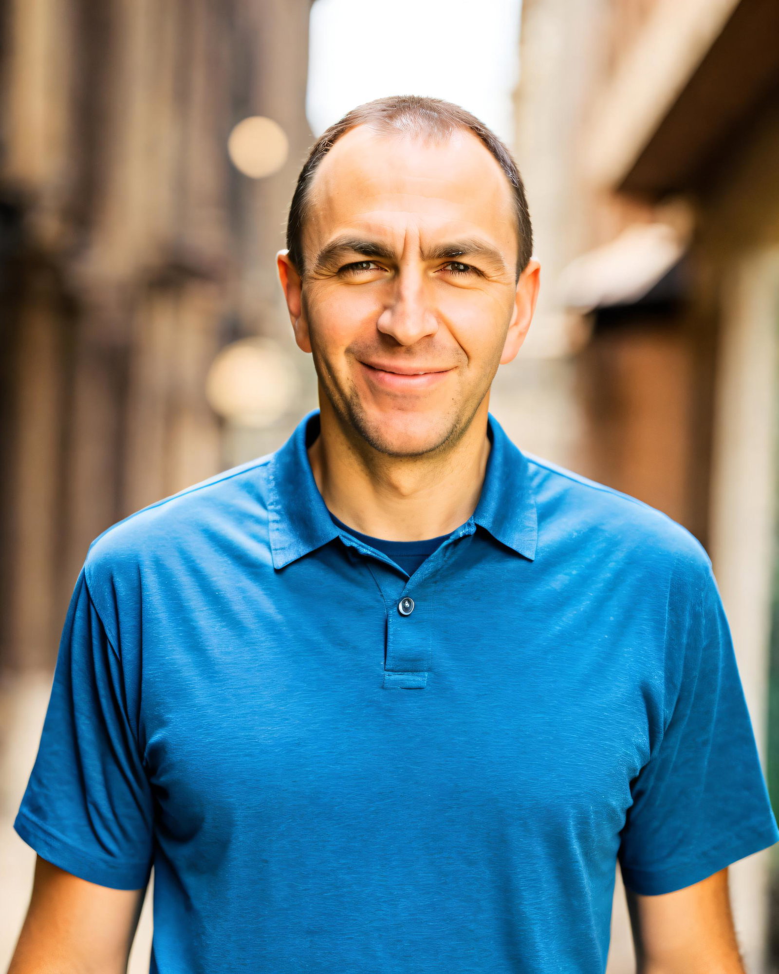 Brad Barrett smiling in an official ChooseFI portrait.